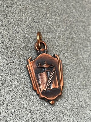 HJ Co. Marked Small Copper Crest w Open Book Pen & Lantern