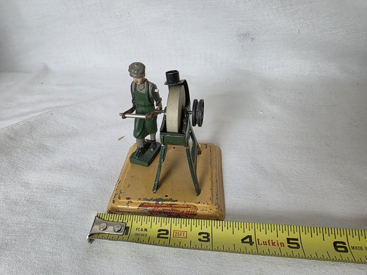 FLEISCHMANN STEAM ENGINE MAN GRINDING STONE TIN TOY ACCESSORY WEST
