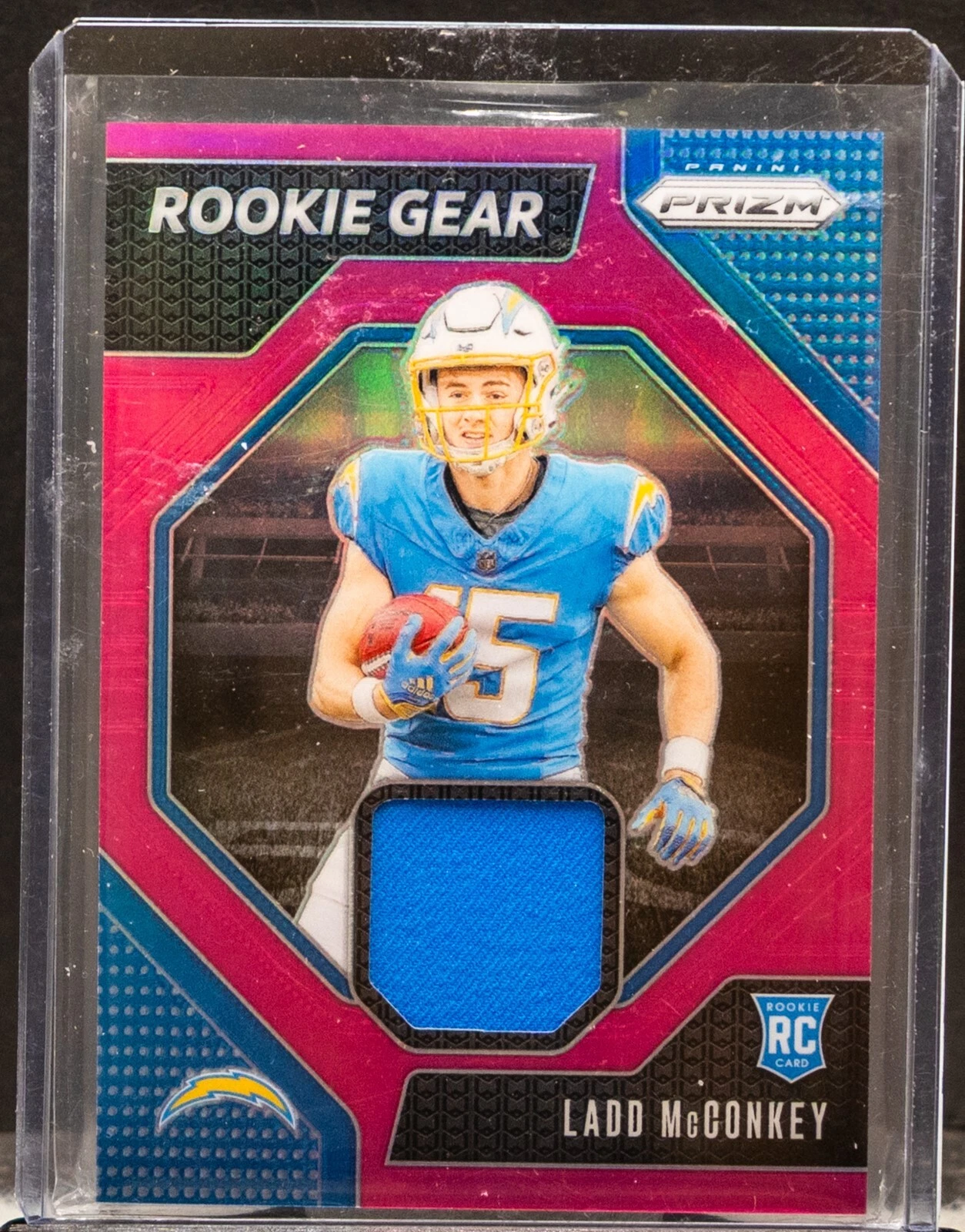 Ladd McConkey 2024 Panini Prizm Pink Prizm RC Rookie Gear Jersey RG-LMY Chargers