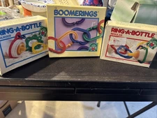 Discovery Toys Vintage Never Used Ring-A-bottle Boxes & Boomerings