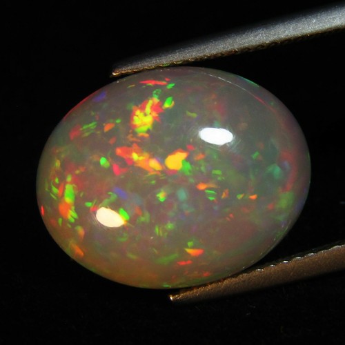 8.28Ct 100% Natural Color Play Unheated White Opal Nice Oval Shape REF VIDEO - Picture 1 of 5