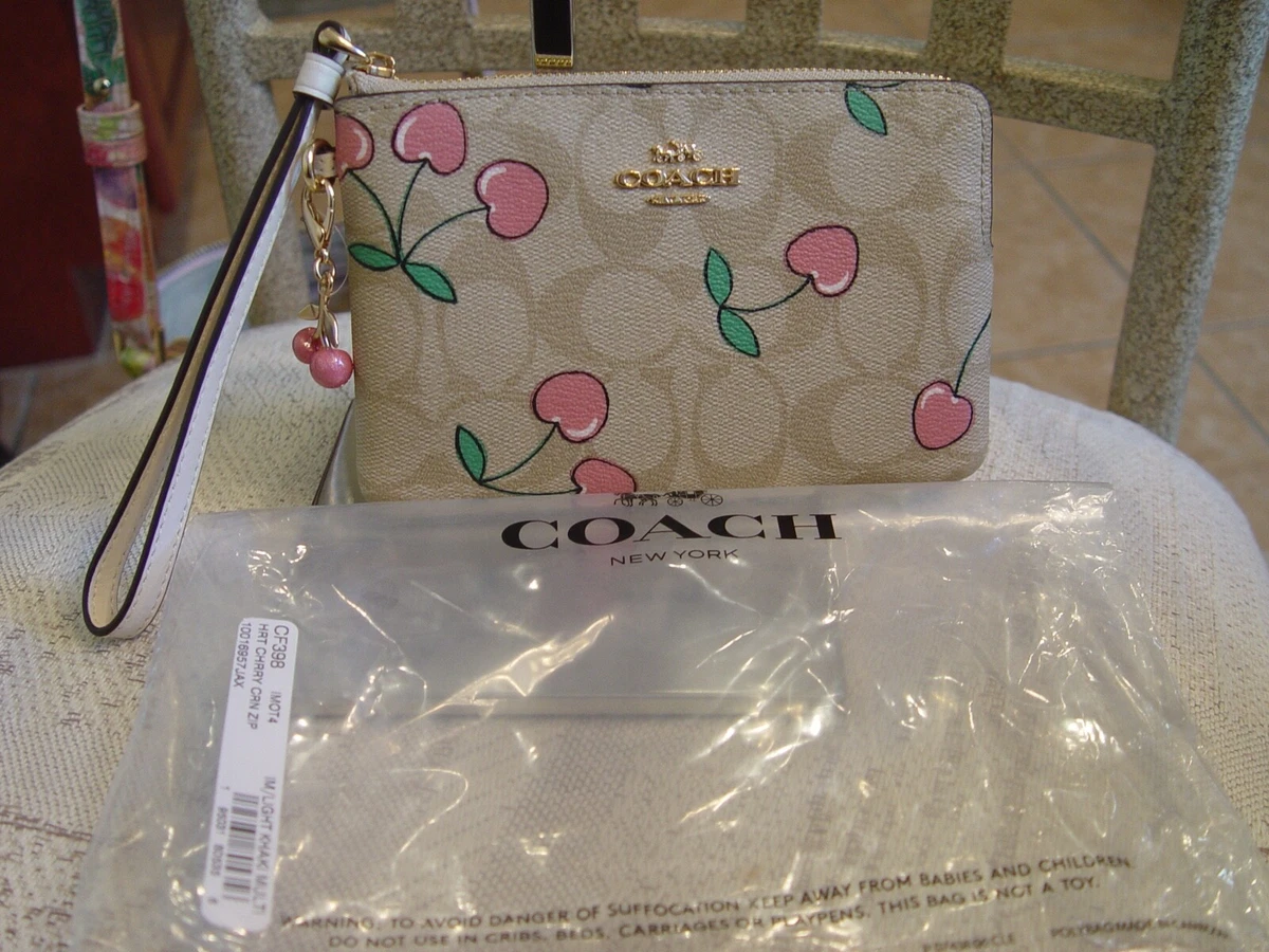 Heart Wristlet In Signature Canvas With Heart Print - Coach