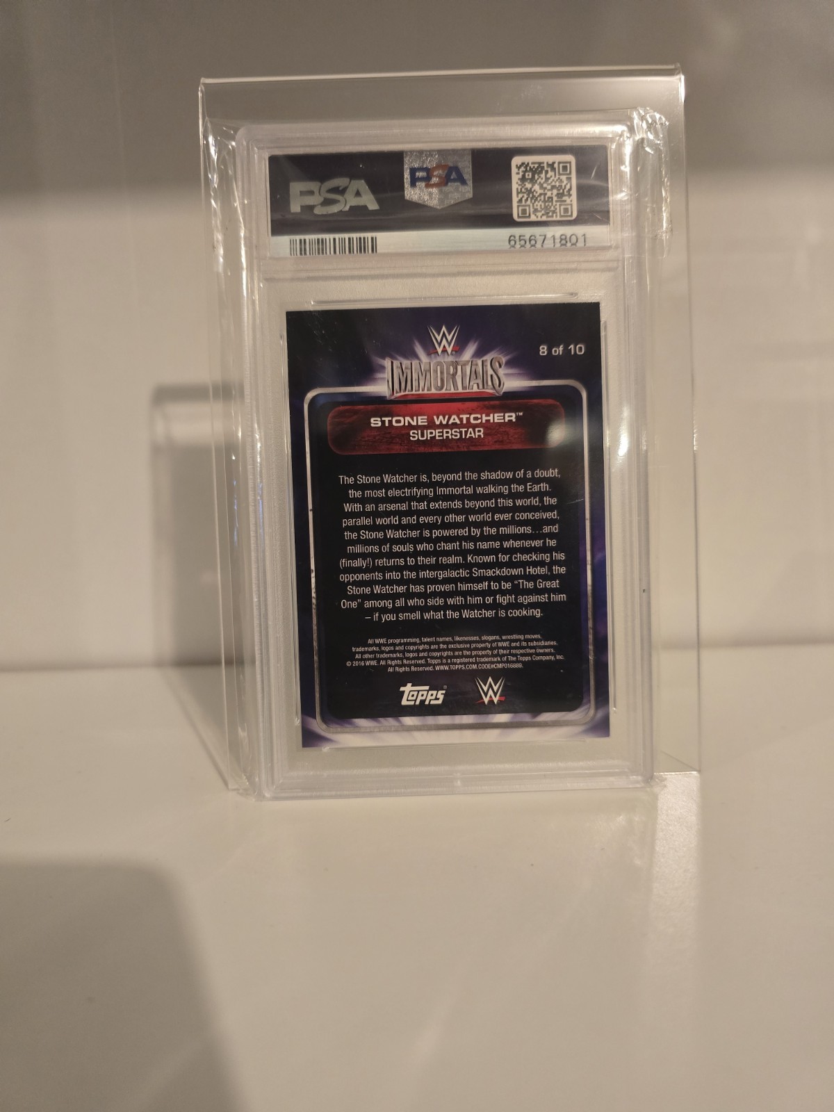2016 Topps WWE Immortals #8 The Rock Stone Watcher PSA 9 Dwayne Johnson view 2