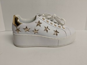 tenis dourado plataforma