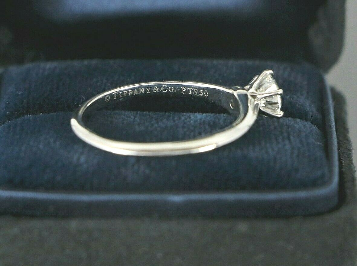 $7650 Tiffany & Co Solitaire Platinum 0.59ct Round G VS1 Diamond