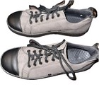 Gray and black Woobies Mod-1 canvas shoes with black laces, tan insoles, and textured rubber soles, men’s 5.5/women 7.