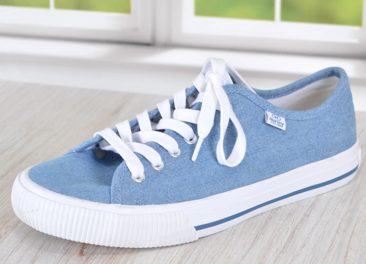 Canvas sneakers with a blue best sale logo