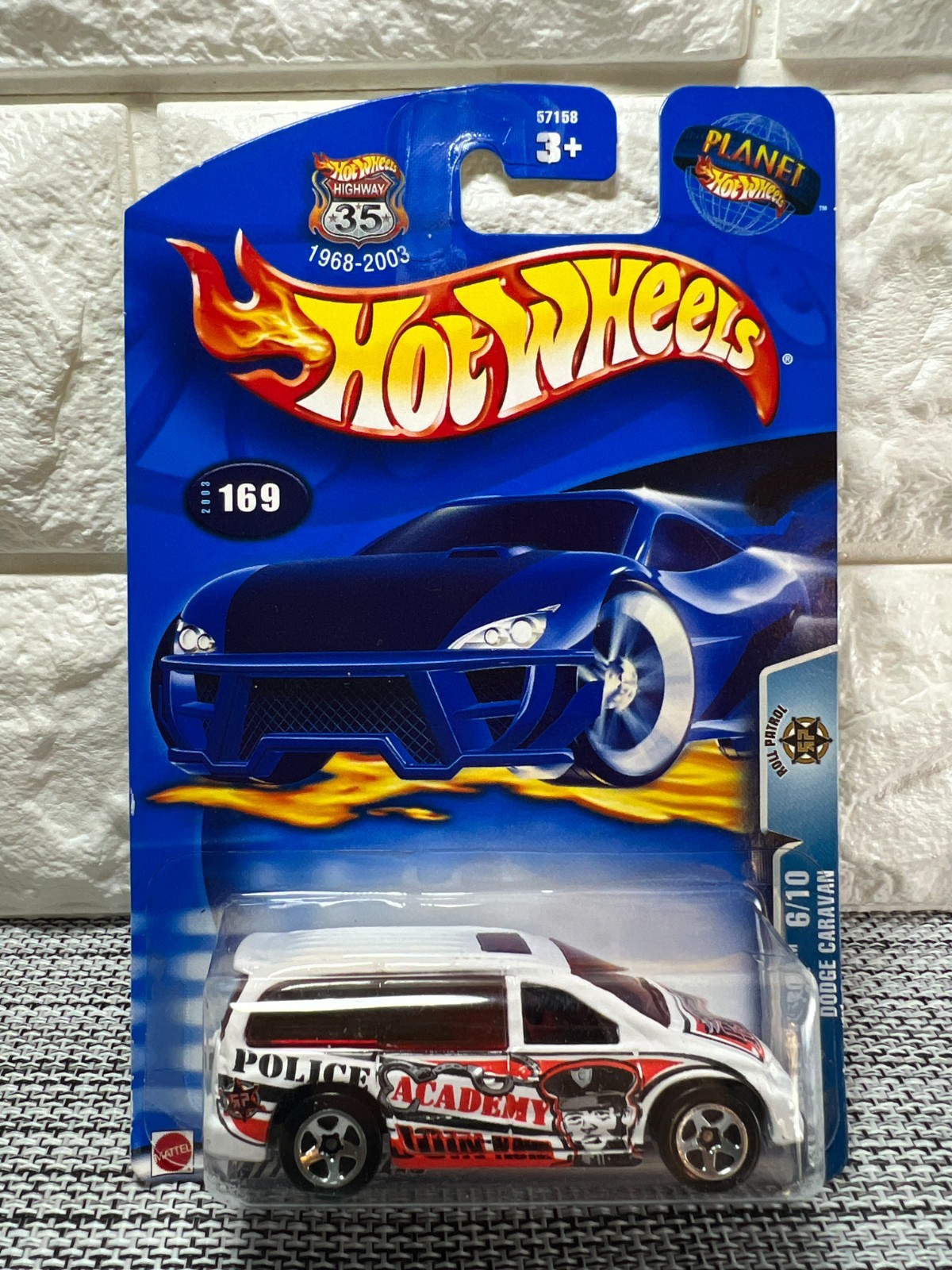 Hot Wheels Roll Patrol 6/10 Dodge Caravan 2003 #169 White