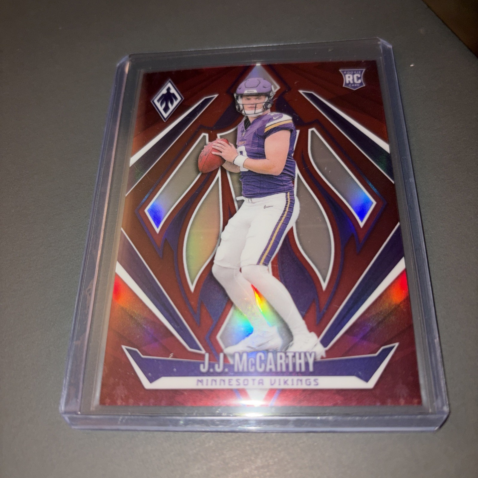 2024 Panini Phoenix - Rookies J.J. McCarthy #185 Red 94 /99 (RC)