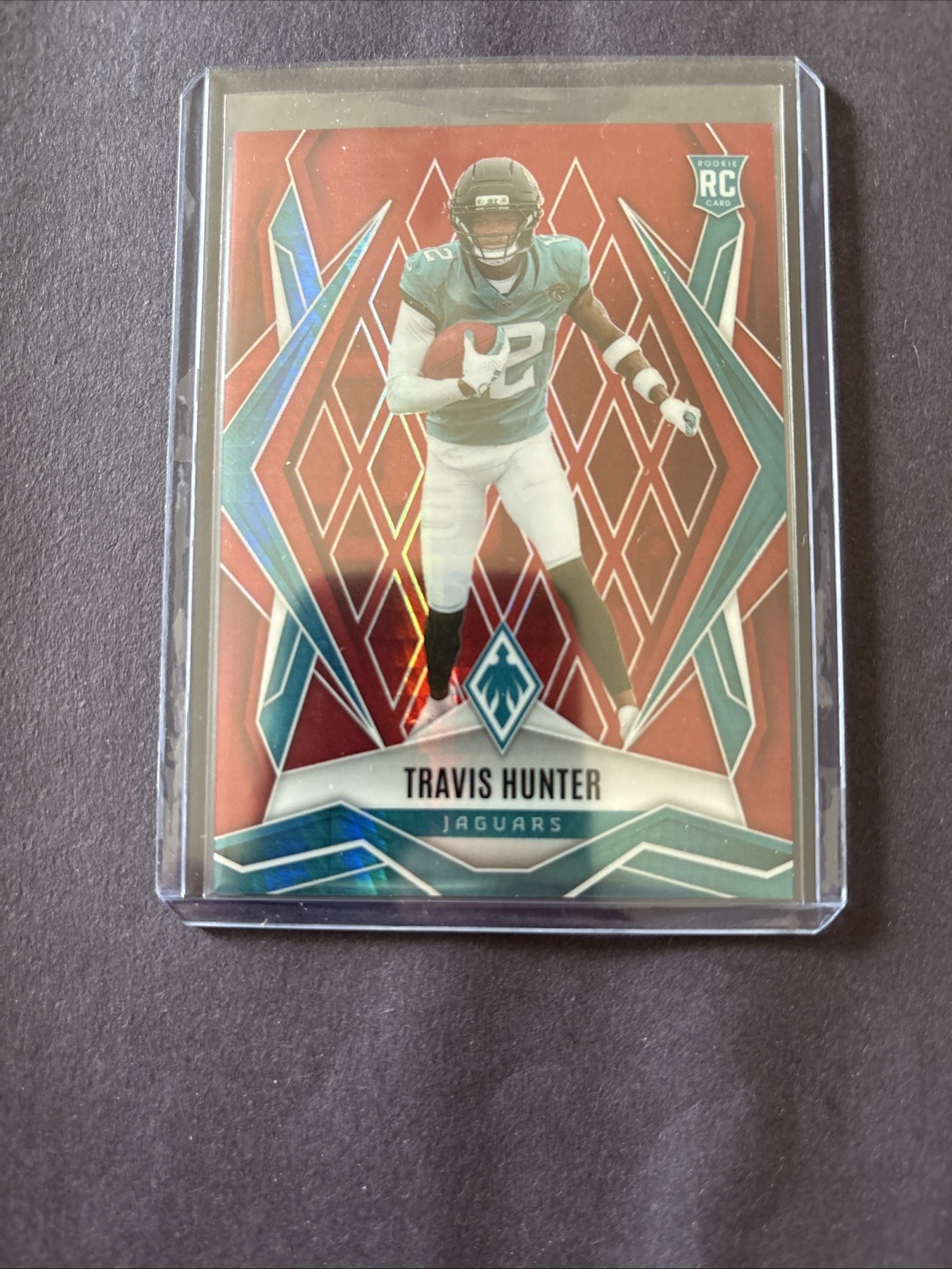 2025 Panini Phoenix - Rookies Travis Hunter #157 Red Hyper /399 (RC)