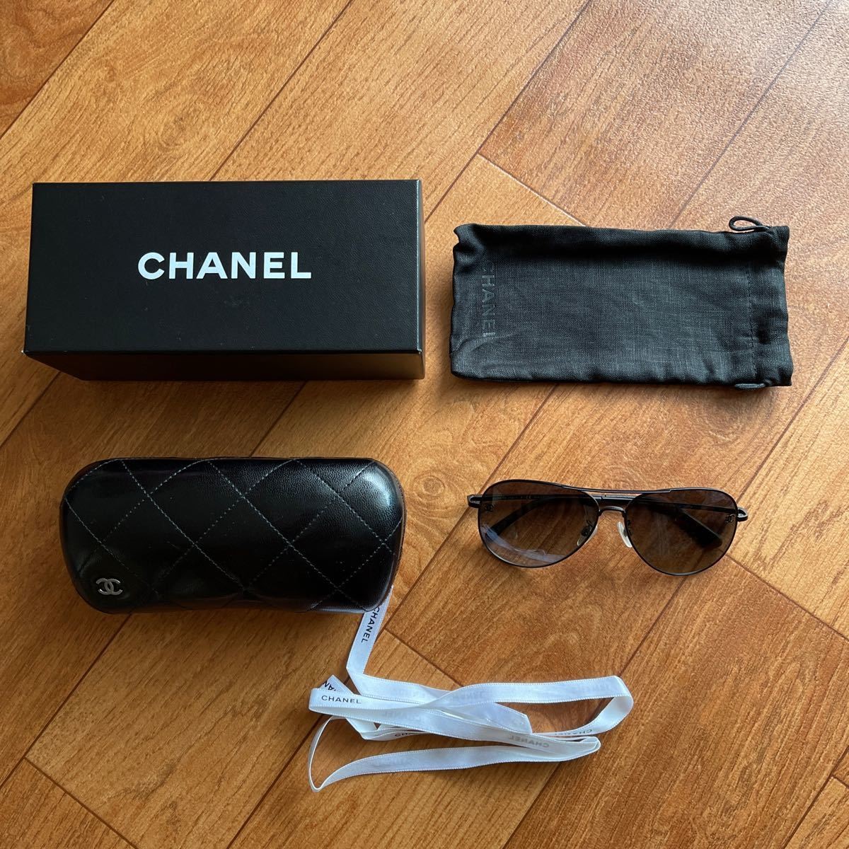 CHANEL black teardrop sunglasses made in Italy with box excellent condition