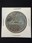 1957 Toned Gem Canadian Silver Dollar Coin