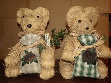 2 oursons en paille décoration florale ( 32 cm de haut - 26 x 23 cm )