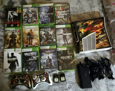 xbox 360 with 12 games,two original controllers with rechargeable batteries.