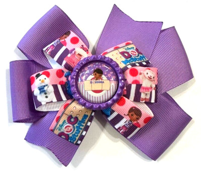 Beautiful Doc McStuffin (Dottie) inspired hair bow for girls.