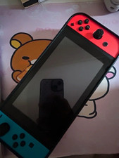 Nintendo Switch Handheld Console with Neon Red/Neon Blue Joy-Con
