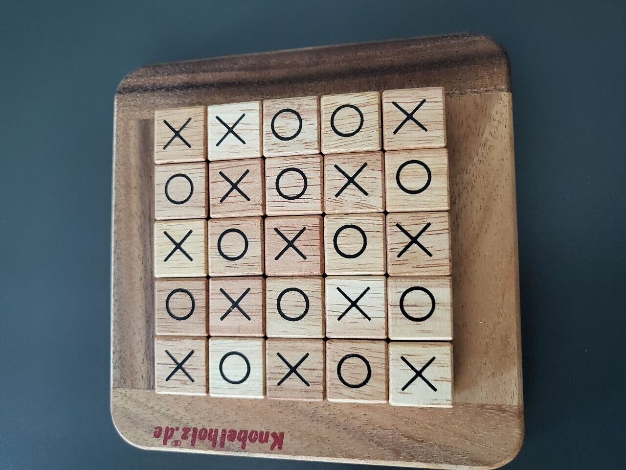 An 5 × 5 board for Kriegspiel Tic-Tac-Toe