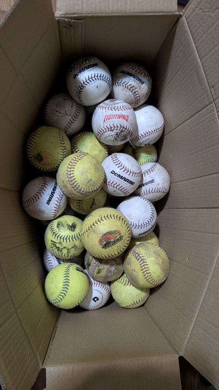 Lot of used softballs (63)