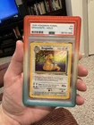 Pokemon Dragonite Holo PSA 7 Fossil 1999 #4 4/62