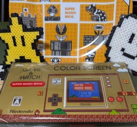Good condition Super MaRIO game watch Nintendo bonus included