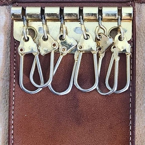 Estuche para llaves Dooney & Bourke de cuero negro y marrón de colección estuche para llaves Dooney & Burke Foto 4 de 4