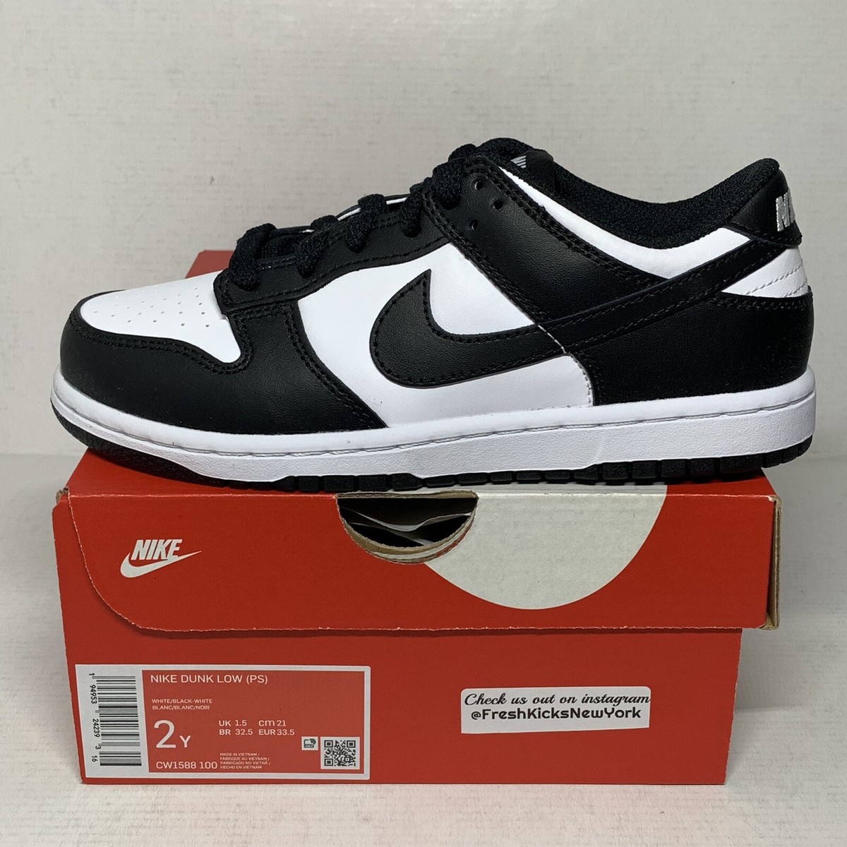 nike dunk low black and white youth