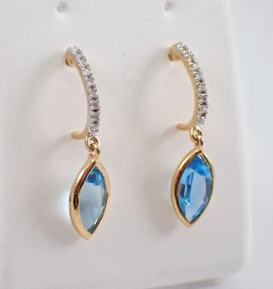 Pendientes colgantes/gotas de topacio azul simulado corte marquesa enchapados en oro amarillo de 14 k Foto 2 de 4