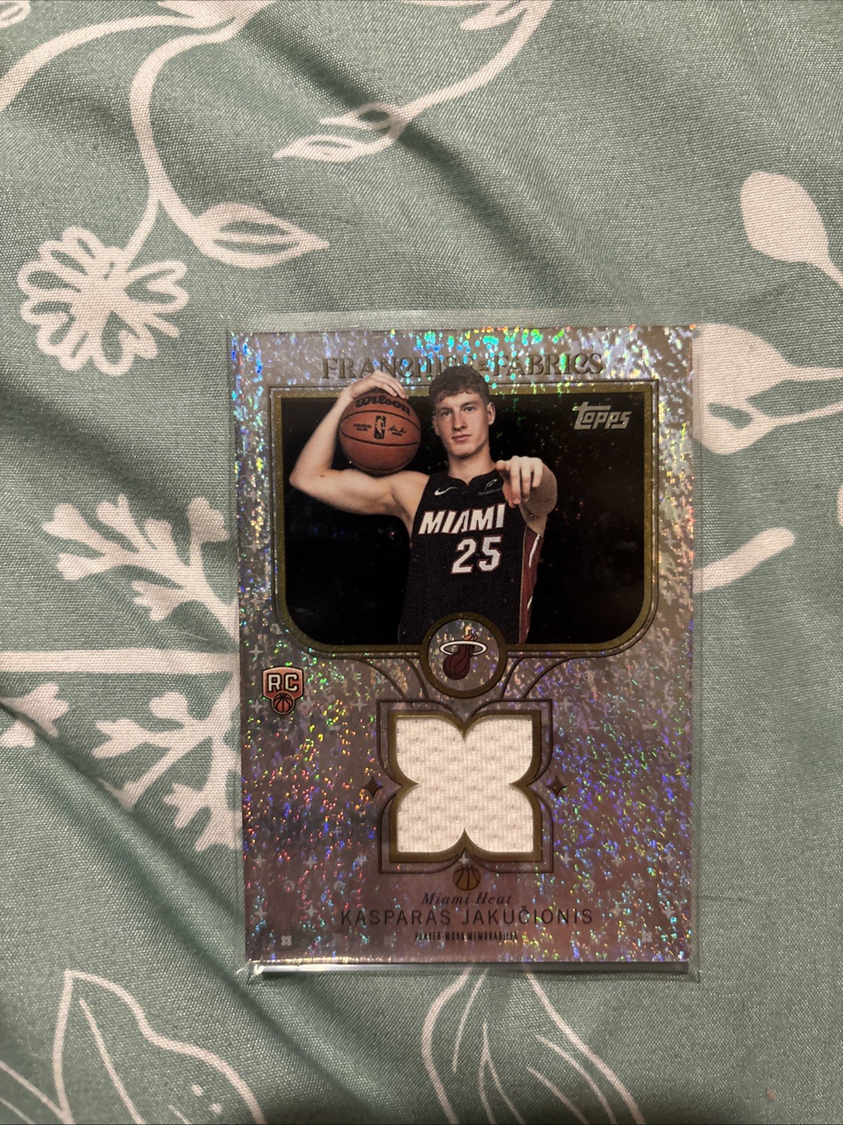 2025-26 Topps - Franchise Fabrics Kasparas Jakucionis #FF-KJ (MEM, RC) Foil