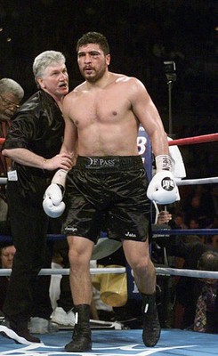 John Ruiz receives a few last words before answering the bell duri- Old Photo