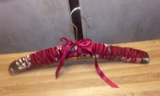 Vintage wooden hanger covered with beautiful silky fabric and fiberfill