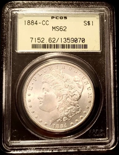 1884-CC $1 PCGS MS62, Light Green Holder