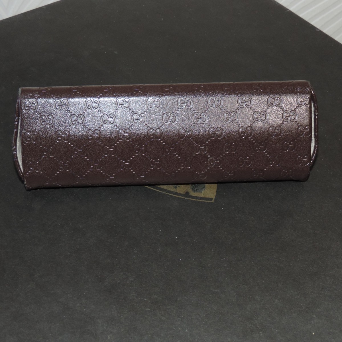 GUCCI Triangular Dark Brown Leather Embossed Logo Glasses  display picture 2