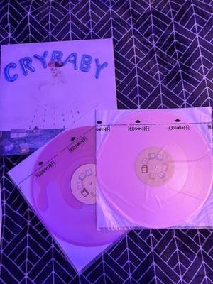 Melanie Martinez's 2015 release, Cry Baby  'spilled milk' and pastel pink LPs 