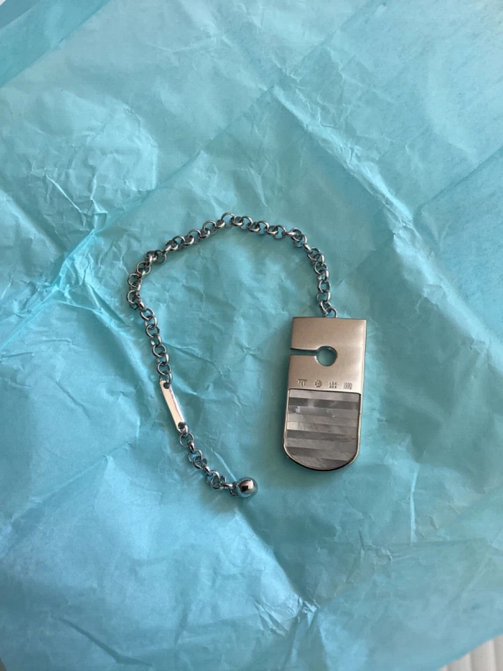 LLAVERO TATEOSSIANO MADRE PERLA RODIO LLAVERO PLATA + BOLSA PARA EL POLVO NUEVO Foto 2 de 3