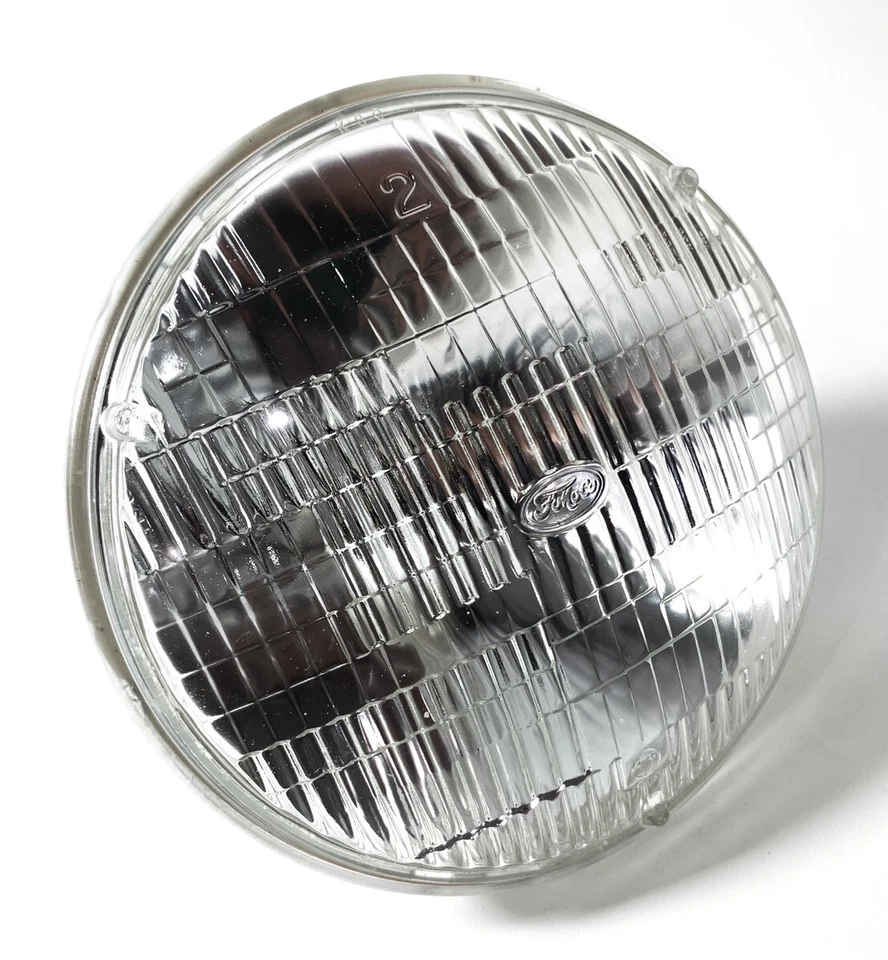 Par de faros halógenos de haz sellado de 7 pulgadas con logotipo de Ford estampado Foto 2 de 4