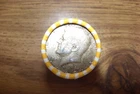 kennedy half dollar roll with a 40% silver 1968 half on end in vV- good cond.