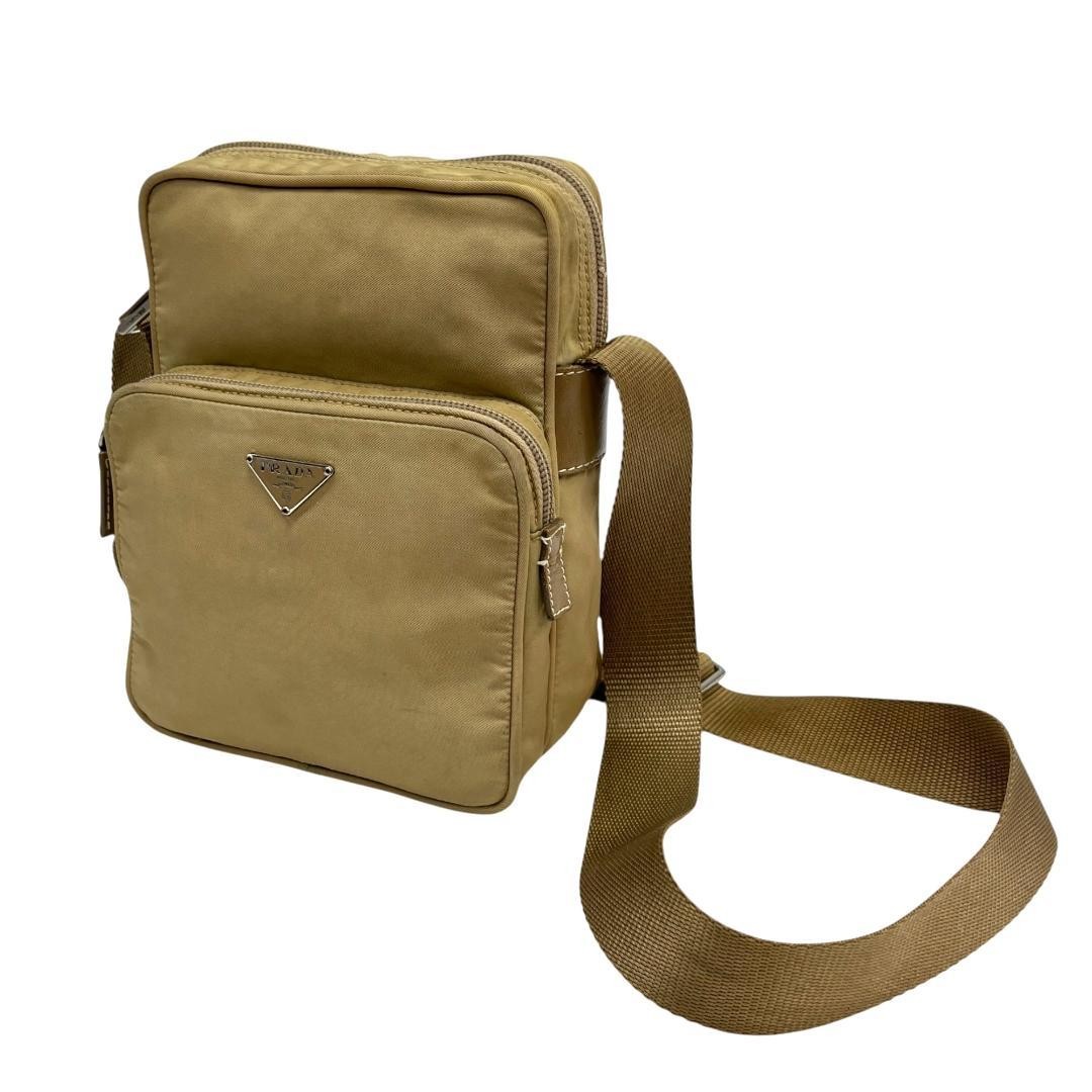 Prada shoulder bag in excellent condition with white tag and triangle plate