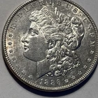 1886 P Morgan Silver Dollar AU