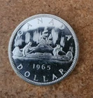 1965 uncirculated Canadian 80% silver dollar
