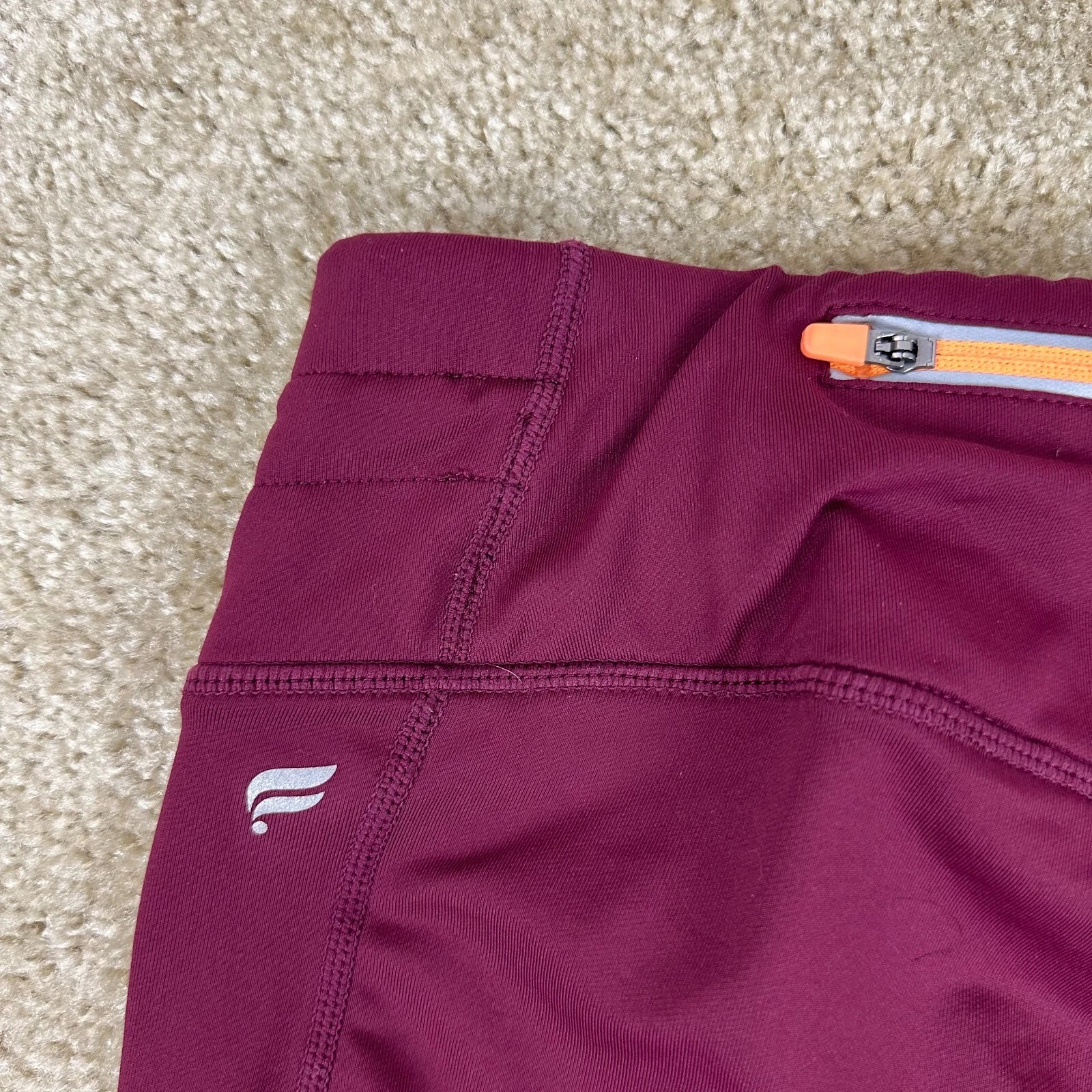 fabletics cold weather mid rise statement zip pocket leggings