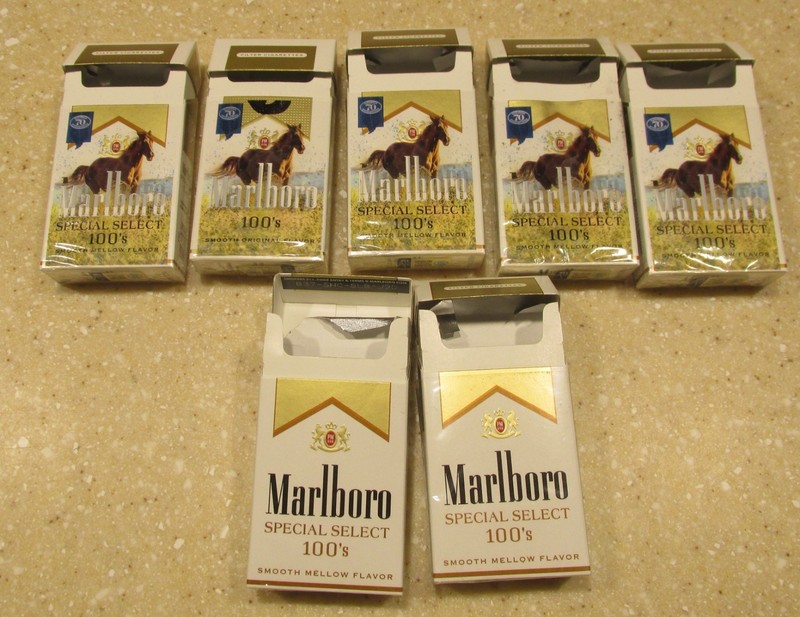 7 Collectible Empty Pack Marlboro Gold 100s 5 have special Cowboy on Horse Wrap.