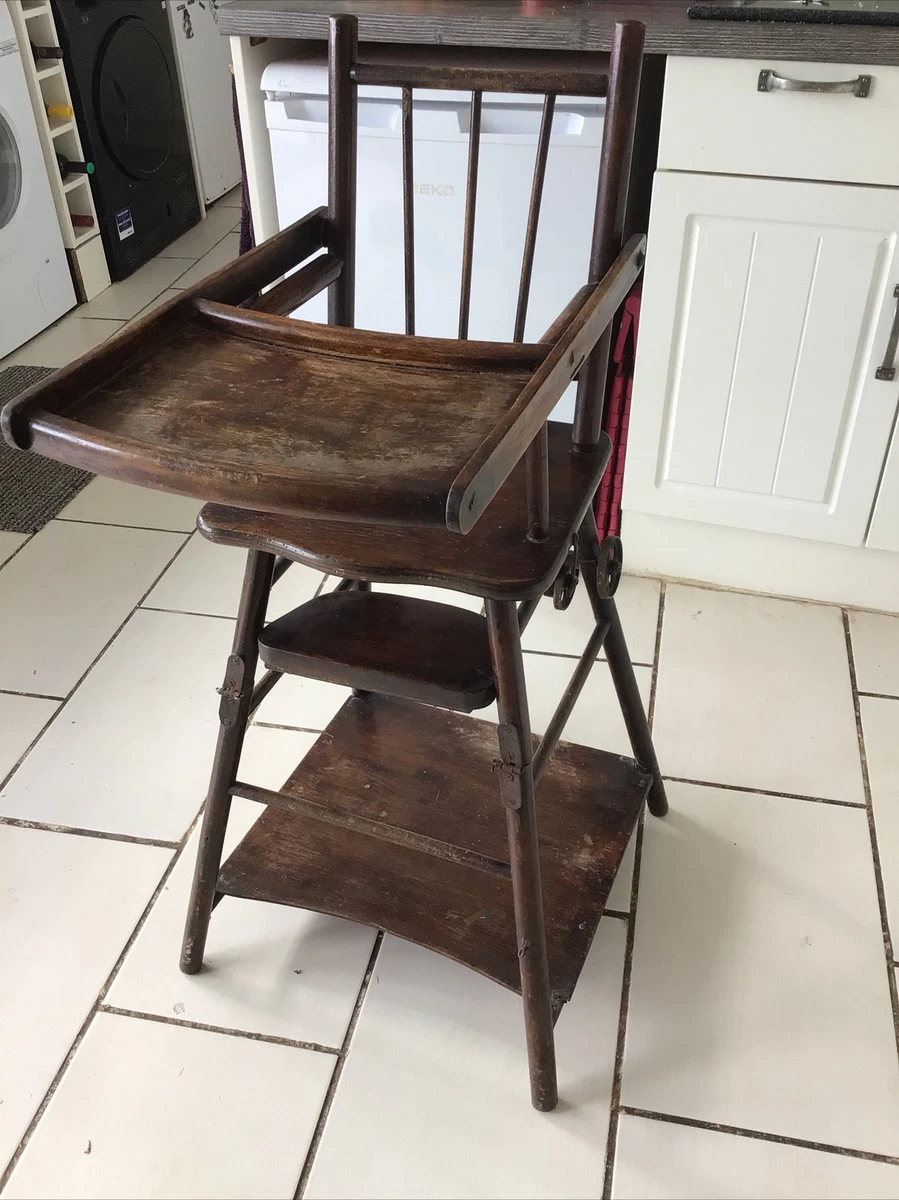 Antique wooden high sales chair with wheels