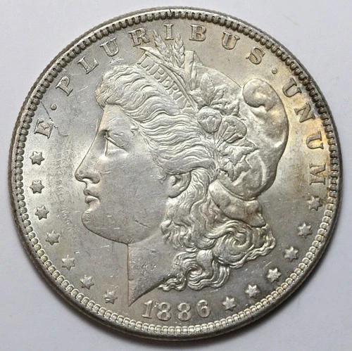 1886 $1 Morgan Silver Dollar Uncirculated - RAW - Lightly Toned / Nice Luster