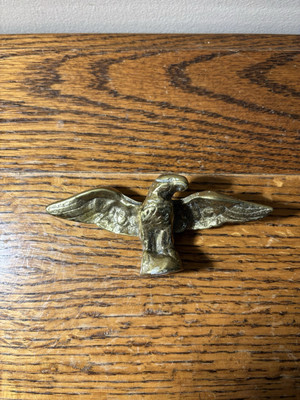 Small solid brass eagle wings open, 5'' long, 2''tall