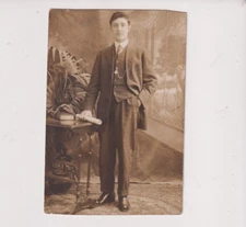 Postcard RPPC Real Photo Young Man Posing Beside Desk AZO ca. 1904-1918