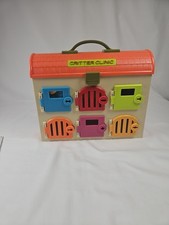 B. Toys Critter Clinic Pretend Veterinarian Partial Set 5 Keys 2 Animals  Case