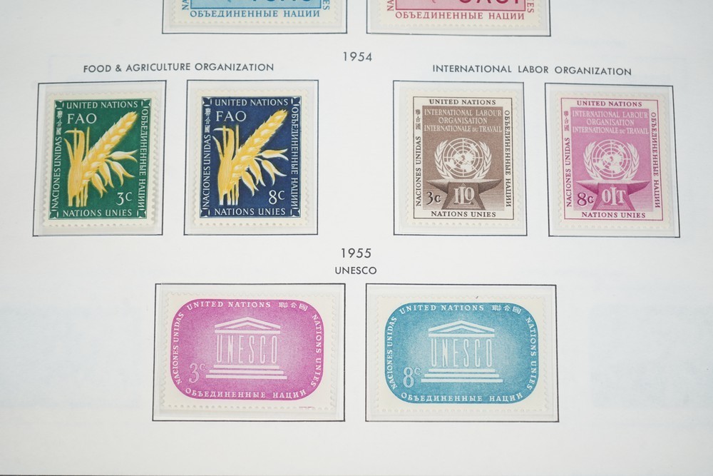 UN 1950s-1990s COLLECTION OF OVER 500 STAMPS ALL MINT STORED IN HARRIS ALBUM