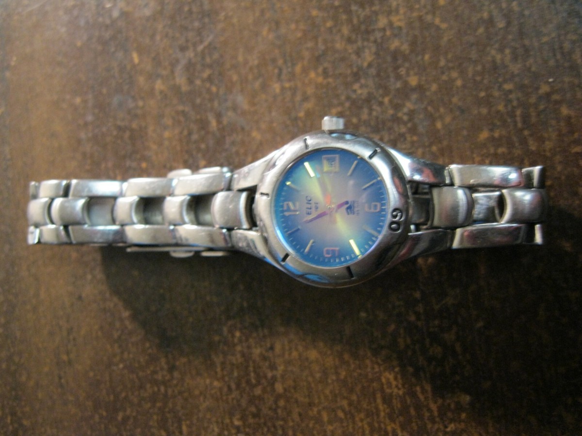Silver Relic watch with a two tone blue and green face Relic Silver Plated Metal, Green Face, | Mercari main image 3
