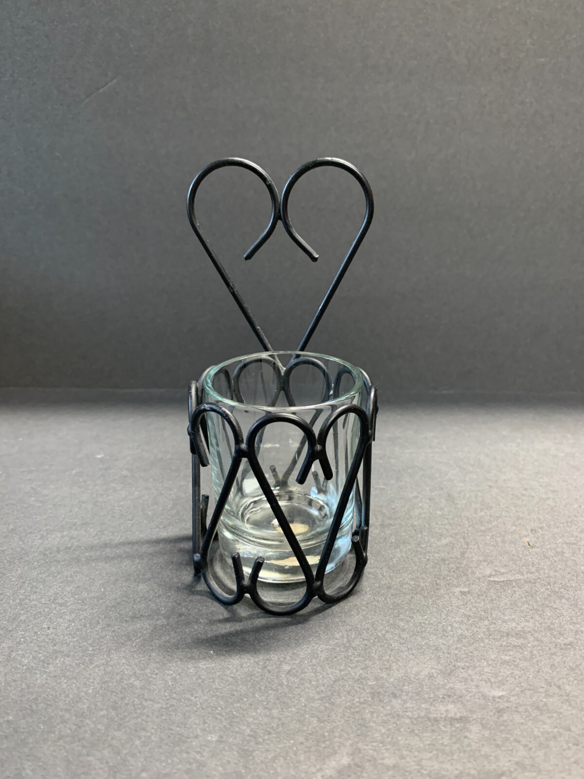 Clear Glass With Black Metal Holder