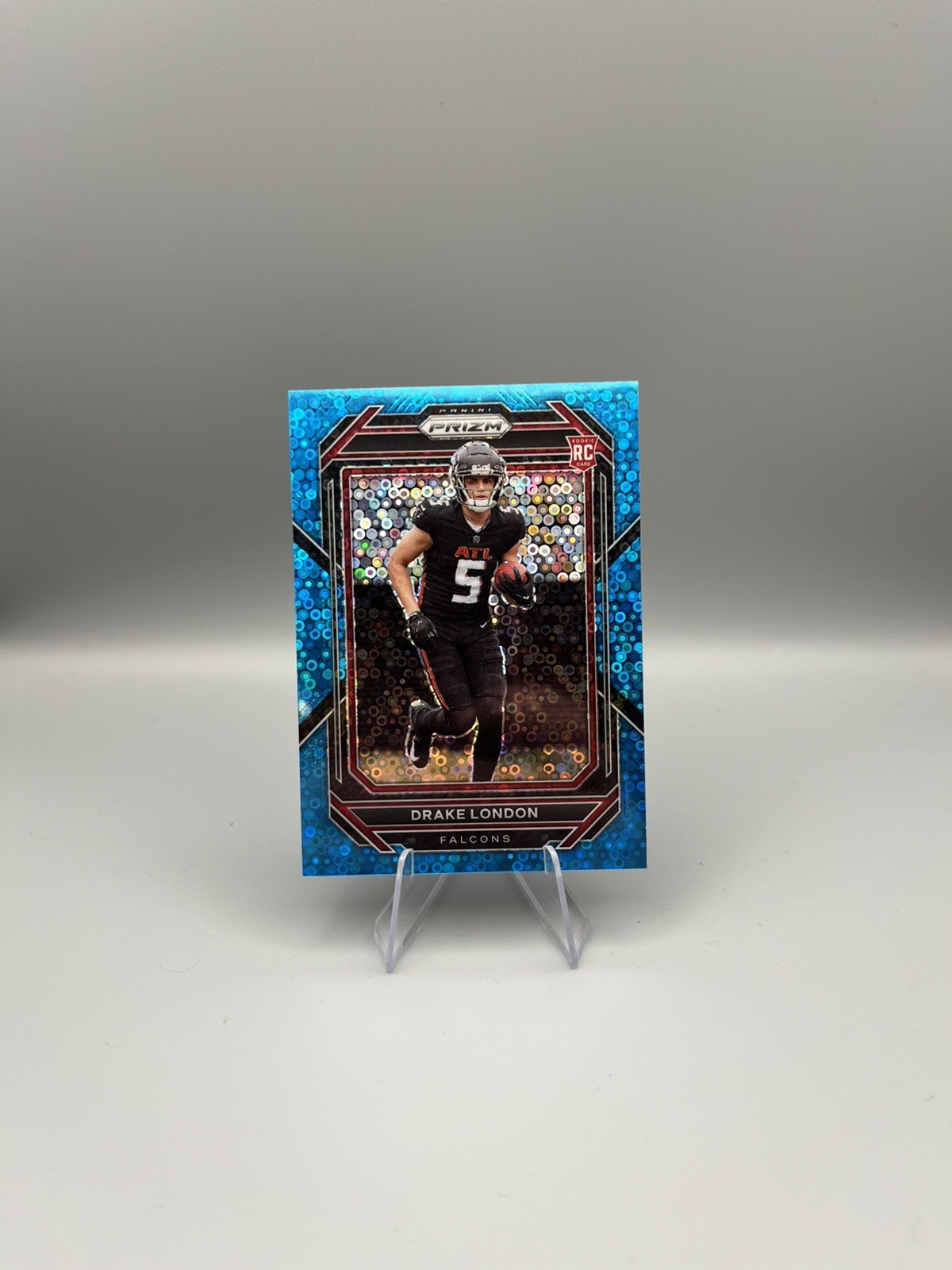 2022 Panini Prizm - Rookies Drake London #308 No Huddle Blue Prizm /79 (RC)